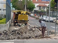 Foto de obras na esquina da sampaio e Batista